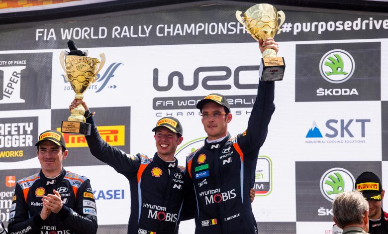 Thierry Neuville (BEL) Martijn Wydaeghe (BEL) of team Hyundai Shell Mobis celebrate on the podium in first place after winning the World Rally Championship in Spa, Belgium on 8.15.2021