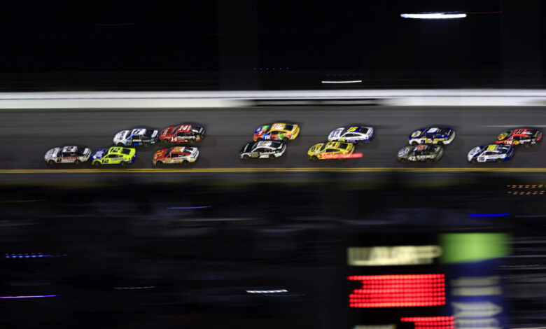 DAYTONA BEACH, FLORIDA - FEBRUARY 20: Austin Cindric, driver of the #2 Discount Tire Ford, leads the field during the NASCAR Cup Series 64th Annual Daytona 500 at Daytona International Speedway on February 20, 2022 in Daytona Beach, Florida.