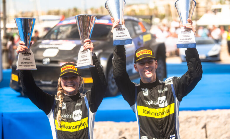 Sami Pajari (FIN) and Enni Mälkönen (FIN) celebrate on the podium in first place after winning the World Rally Championship WRC 2 class in Alghero, Italy on 02.06.2024 //