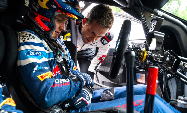 Adrien Fourmaux (FRA) Of team M-SPORT FORD WORLD RALLY TEAM and Seastien Ogier (FRA) Of team TOYOTA GAZOO RACING WRT seen watching Rally TV during the World Rally Championship Finland in Jyvasküla, Finland on 1,August. 2024 //
