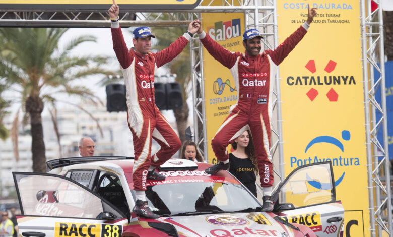 Nasser Al-Attiyah celebrates the podium during the FIA World Rally Championship 2015 in Salou, Spain on October 25, 2015