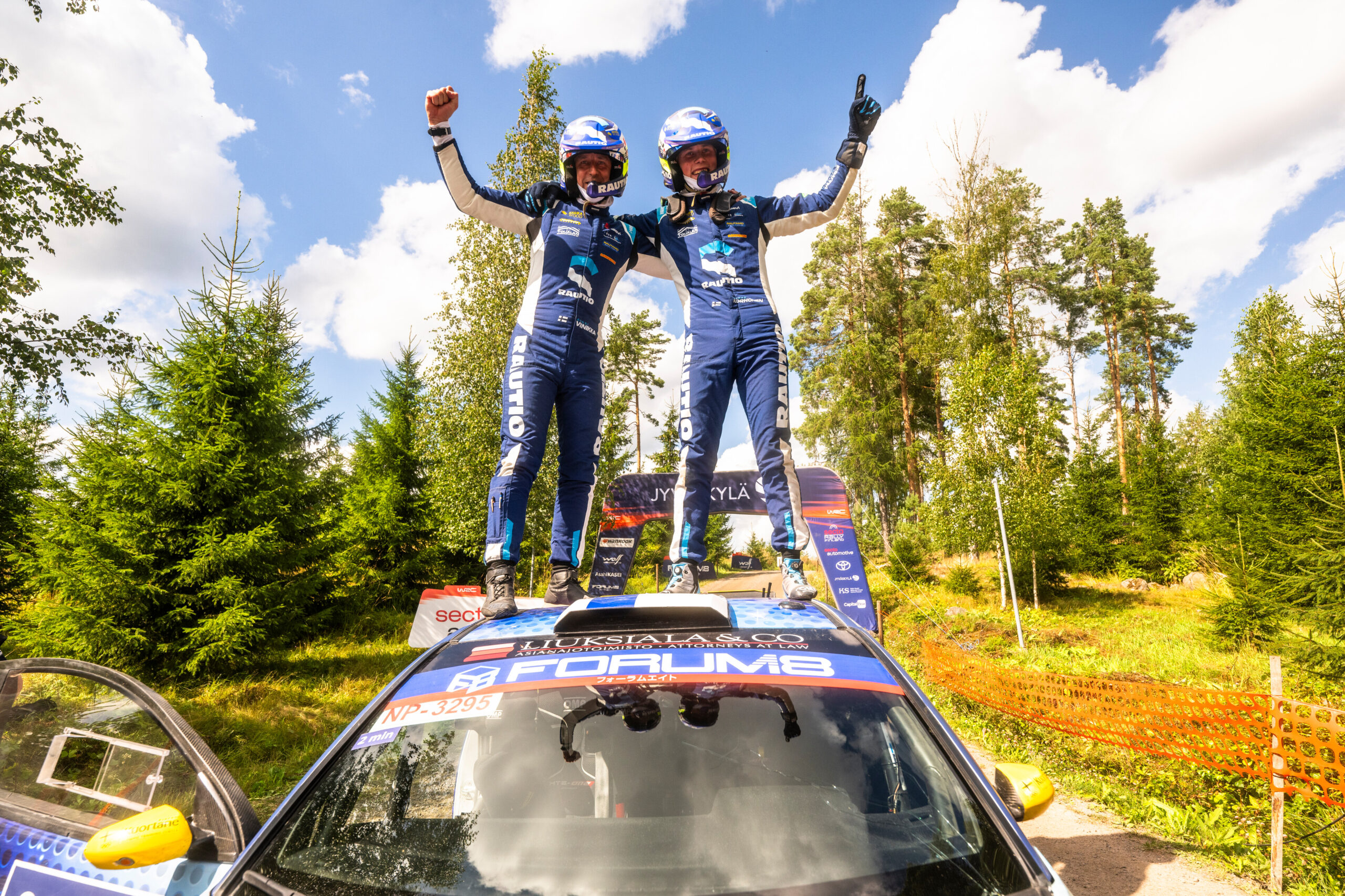 Roope Korhonen (FIN) Anssi Viinikka (FIN) celebrate on the podium in first place after winning the World Rally Championship WRC 2 category in Jyvasküla, Finland on 3.08.2025 //