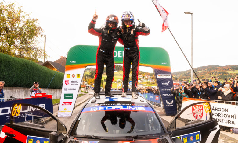 Kalle Rovanperä (FIN) Jonne Halttunen (FIN) Of Toyota Gazoo Racing Wrt celebrate on the podium in first place after winning the World Rally Championship in Passau, Germany on 19.10.2025 //