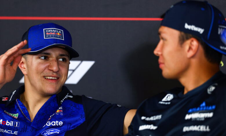 BAHRAIN, BAHRAIN - FEBRUARY 20: Isack Hadjar of France and Oracle Red Bull Racing and Alexander Albon of Thailand and Williams talk in the Drivers Press Conference during day three of F1 Testing at Bahrain International Circuit on February 20, 2026 in Bahrain, Bahrain. (Photo by