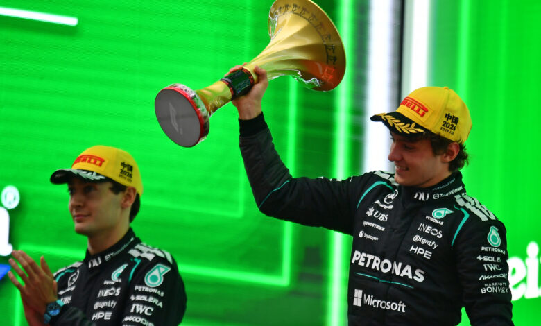 SHANGHAI, CHINA - MARCH 15: Race winner Andrea Kimi Antonelli of Italy and Mercedes AMG Petronas F1 Team lifts his trophy on the podium during the F1 Grand Prix of China at Shanghai International Circuit on March 15, 2026 in Shanghai, China. (Photo by