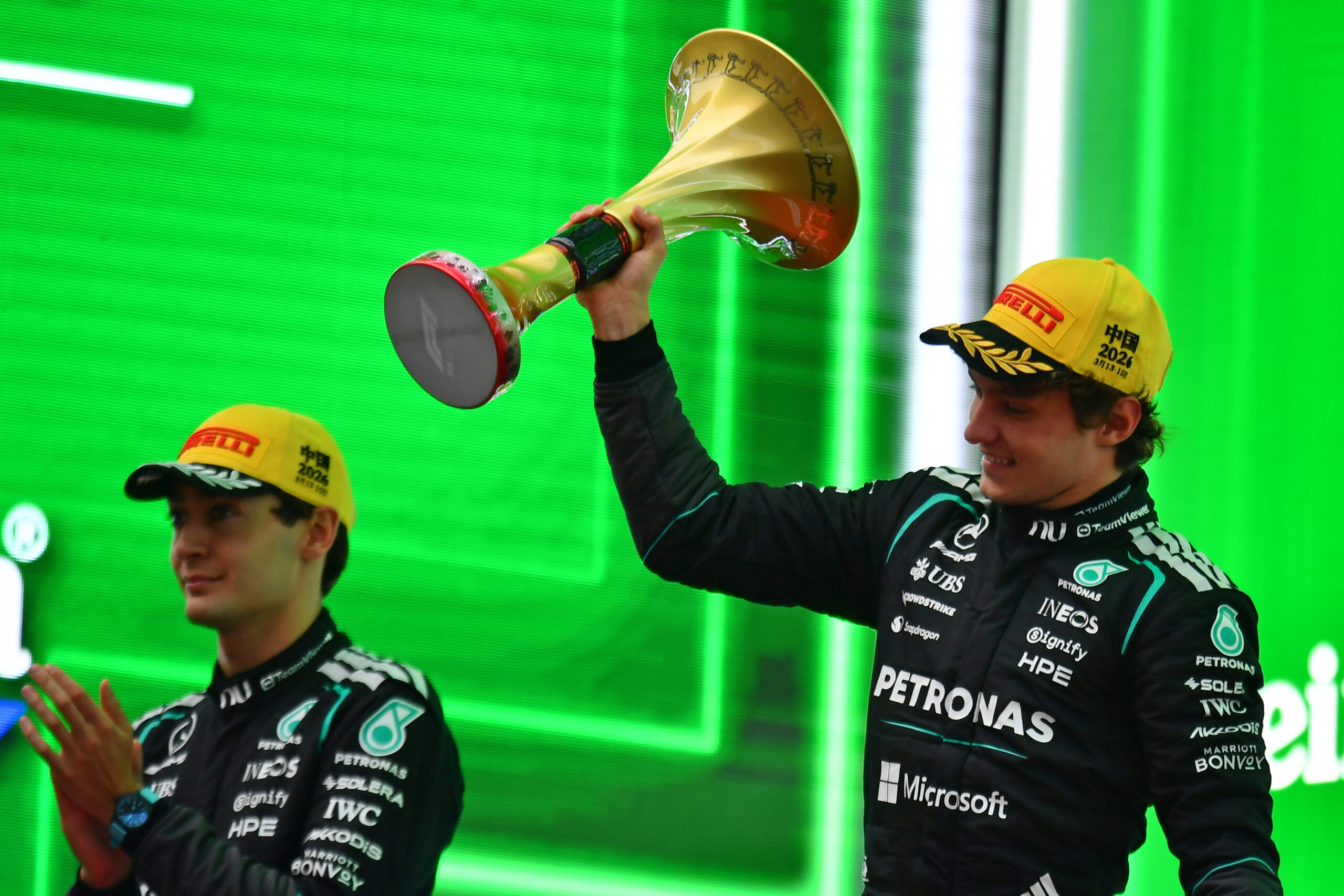 SHANGHAI, CHINA - MARCH 15: Race winner Andrea Kimi Antonelli of Italy and Mercedes AMG Petronas F1 Team lifts his trophy on the podium during the F1 Grand Prix of China at Shanghai International Circuit on March 15, 2026 in Shanghai, China. (Photo by
