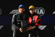 SHANGHAI, CHINA - MARCH 14: Pole position qualifier Andrea Kimi Antonelli of Italy and Mercedes AMG Petronas F1 Team is presented with his Pirelli Pole Position award by Lin Xiaojun during qualifying ahead of the F1 Grand Prix of China at Shanghai International Circuit on March 14, 2026 in Shanghai, China. (Photo by
