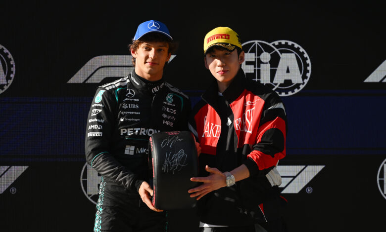 SHANGHAI, CHINA - MARCH 14: Pole position qualifier Andrea Kimi Antonelli of Italy and Mercedes AMG Petronas F1 Team is presented with his Pirelli Pole Position award by Lin Xiaojun during qualifying ahead of the F1 Grand Prix of China at Shanghai International Circuit on March 14, 2026 in Shanghai, China. (Photo by