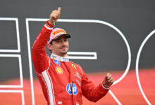 SUZUKA, JAPAN - MARCH 29: Third placed Charles Leclerc of Monaco and Scuderia Ferrari celebrates on the podium during the F1 Grand Prix of Japan at Suzuka Circuit on March 29, 2026 in Suzuka, Japan. (Photo