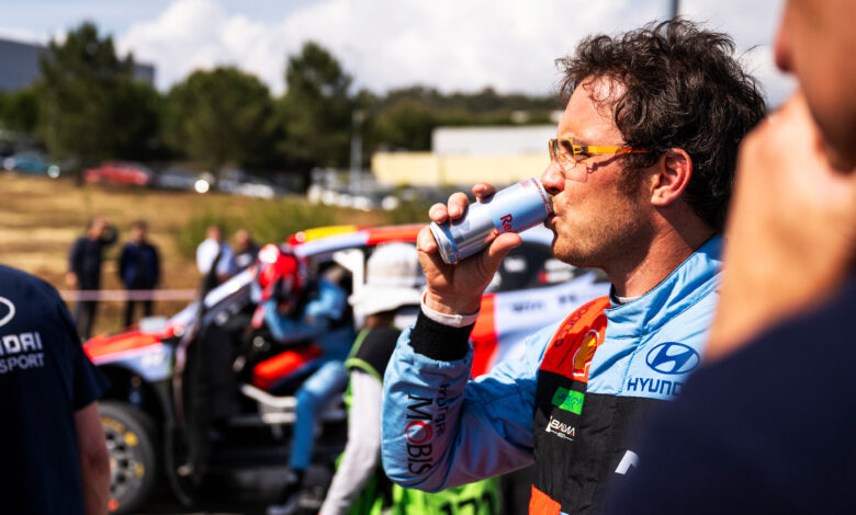 Thierry Neuville (BEL) of HYUNDAI SHELL MOBIS WORLD RALLY TEAM drinks a can of Red Bull Zero during Stop 6 of the FIA World Rally Championship in Porto, Portugal on May 6, 2026.