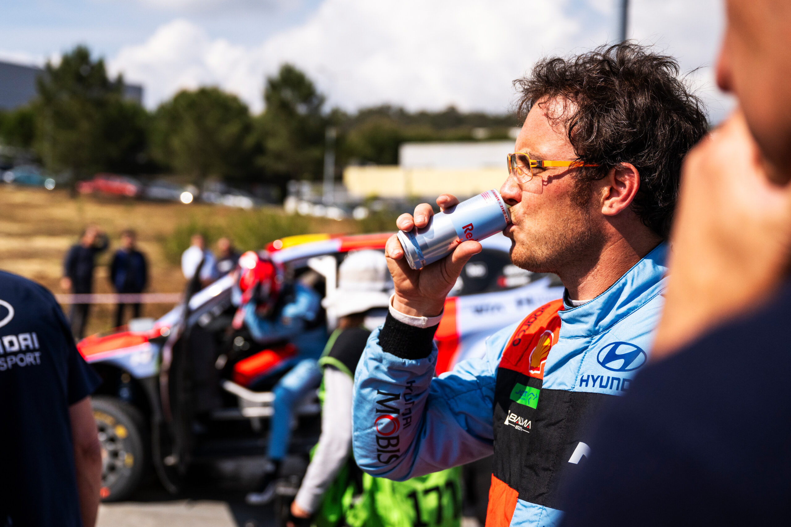 Thierry Neuville (BEL) of HYUNDAI SHELL MOBIS WORLD RALLY TEAM drinks a can of Red Bull Zero during Stop 6 of the FIA World Rally Championship in Porto, Portugal on May 6, 2026.